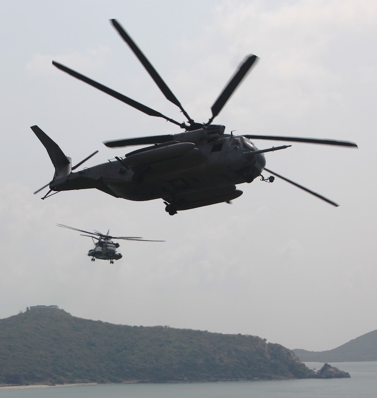 CH-53E Super Stallion helicopter with Marine Medium Helicopter Squadron 262 (reinforced), 31st Marine Expeditionary Unit, 3rd Marine Expeditionary Brigade, provide air support for ground forces during a mock amphibious assault, Feb. 10, in support of exercise Cobra Gold 2011.Cobra Gold 2011 is a multinational training exercise aimed at maintaining regional peace and security.