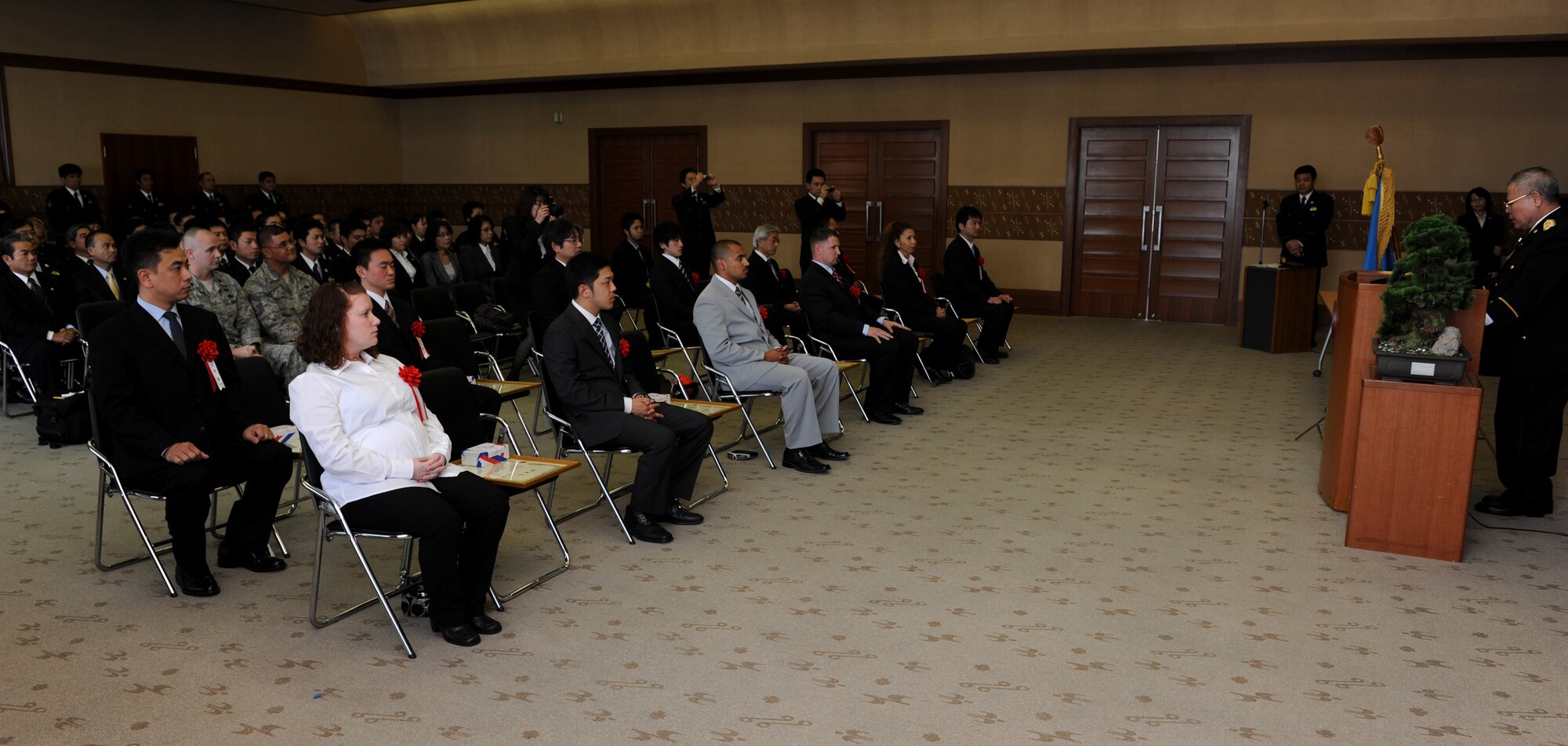 Three members from the 18th Security Forces Squadron, Kadena Air Base, were among those presented with a letter of appreciation from Mr. Akira Namihira, Senior Police Superintendent, Director of Community Safety Department, at the Okinawa Prefectural Police Headquarters in Naha, Okinawa, Feb. 10. 

The crime prevention program was established by the Juvenile Section of the Okinawa Prefecture Police along with the collaboration and support of the 18th SFS. Working together, 18th SFS and OPP have provided crime prevention classes to more than 500 students with the goal of informing and educating school-aged children about crime prevention and crime standards both on and off base. As a result, the crime rate involving juvenile, SOFA-status personnel has gone down both on and off base. 
 (U.S. Air Force Photo/Junko Kinjo) 
