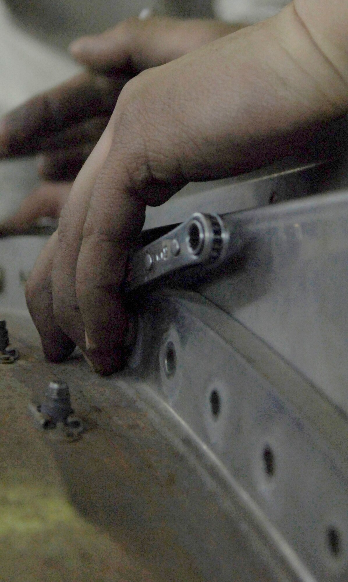 Airman 1st Class Colten Papke torques a bolt on a KC-135 Stratotanker engine Feb. 8, 2011 inside a hangar at Grant County International Airport in Moses Lake, Wash.  Airman Papke is a maintainer with the 92nd Aircraft Maintenance Squadron and is working out of this location for two weeks. When his two week rotation is done here, he will return to Fairchild and work on Fairchild tankers at the Spokane International Airport. Flight operations are performed in these locations because Fairchild’s runway is being repaired. (U.S. Air Force photo/ Senior Airman Natasha E. Stannard)