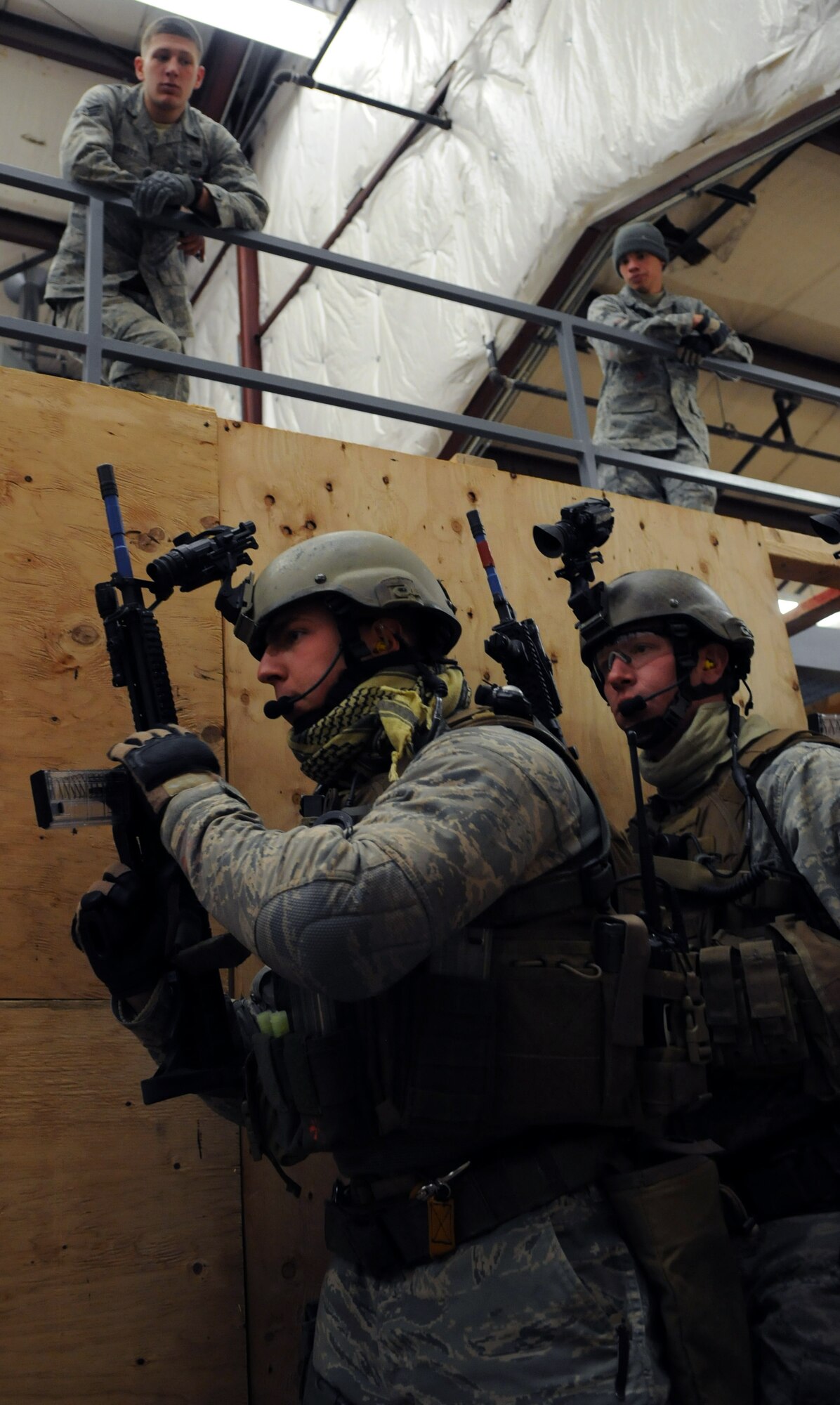 Senior Airman Bryan Kovalik leads members of the 90th SFG/TRF through an Air Force sponsored Blue Coach training scenario Feb. 2. (U.S. Air Force photo by R.J. Oriez)