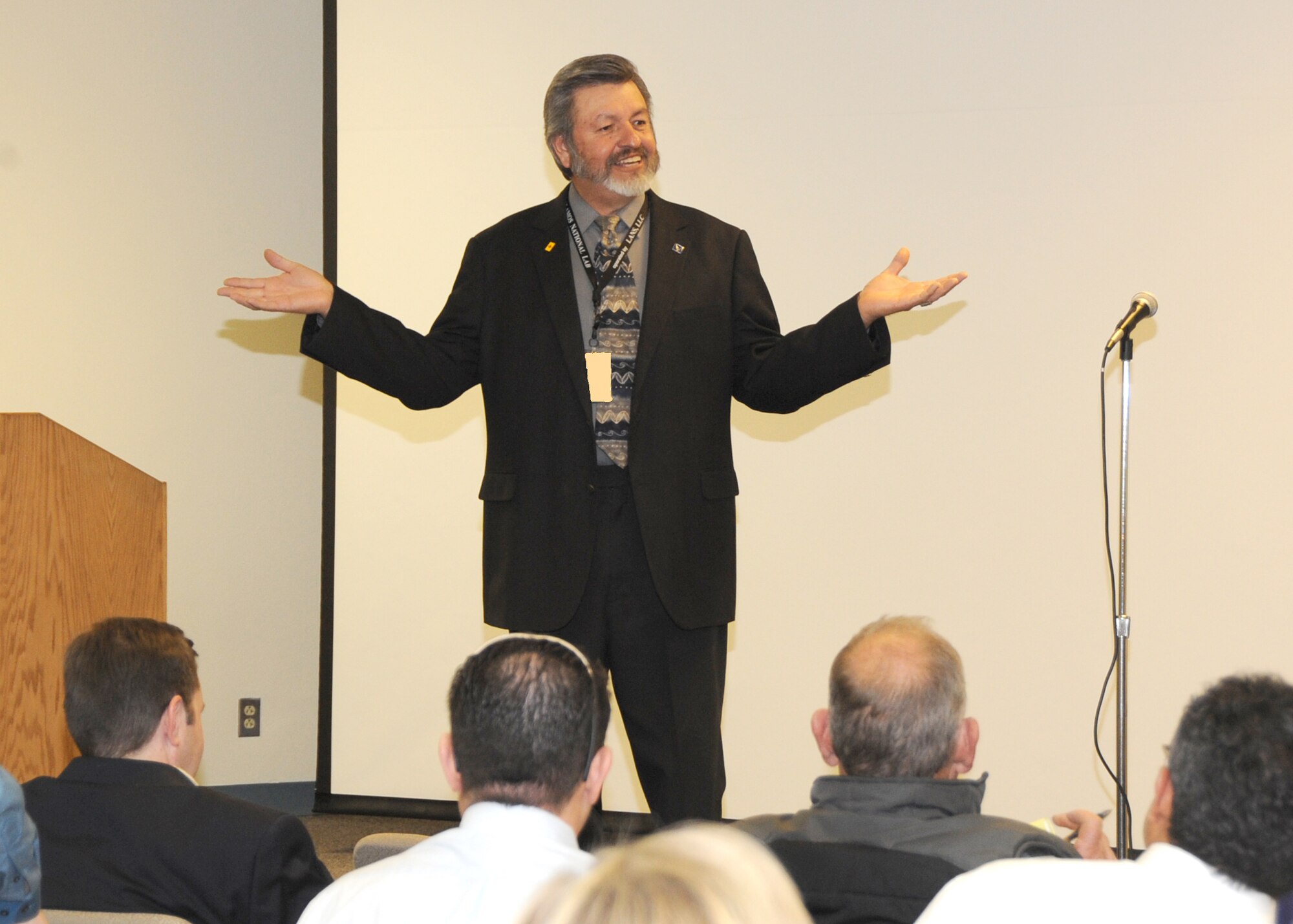 Francisco Tapia, Kirtland Air Force Base Small Business Programs director, welcomes 130 participants to the quarterly networking meeting Jan. 26 at Building 1900. U.S. Air Force Photo by Dennis Carlson.