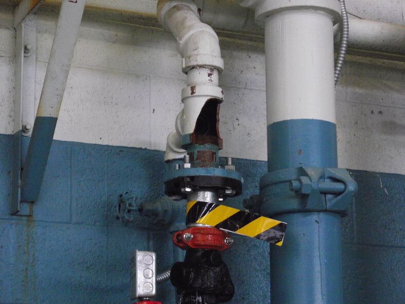 Water pipes base-wide ruptured due to below-freezing temperatures during last week’s extreme cold.  U.S. Air Force Photo by Brian Brackens.