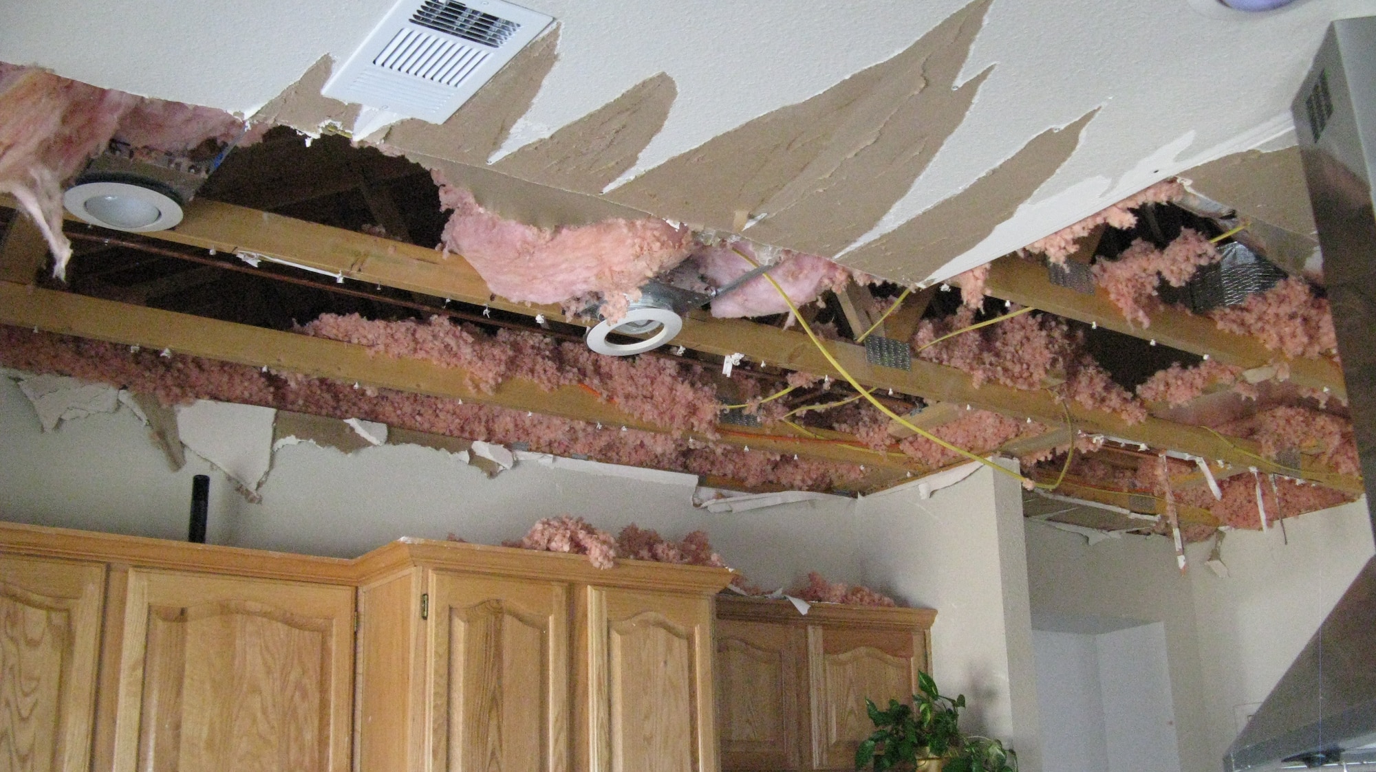Freeze-ruptured water pipes caused ceiling damage to several homes on Kirtland Air Force Base. The damage and lack of heat caused many families to be temporarily housed off base. Courtesy Photo