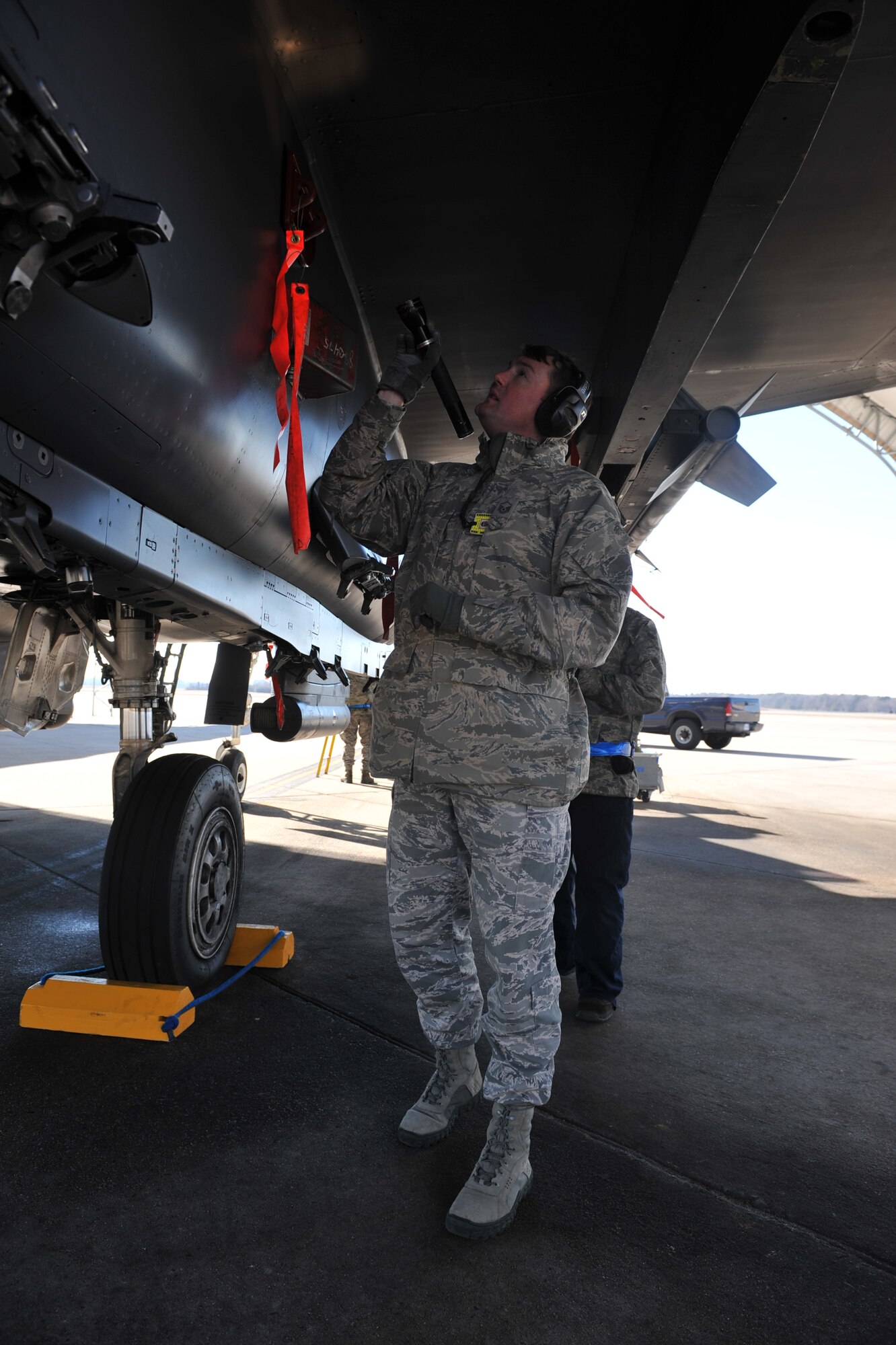 SEYMOUR JOHNSON AIR FORCE BASE, N.C. – Master Sgt. Michael Gregory verifies the electronic aircraft’s technical orders are current with Staff Sgt. Nathan Van Dyne during the Logistics Compliance Assessment Program inspection here, Feb. 9, 2011. Tough books are used to guide each Airman step by step through maintenance procedures on the aircraft. Sergeant Van Dyne, 4th Aircraft Maintenance Squadron crew chief, hails from Barnesville, Ohio.  Sergeant Gregory is a Logistics Compliance Assessment Team Augmentee. (U.S. Air Force photo/Senior Airman Whitney Lambert) (RELEASED)