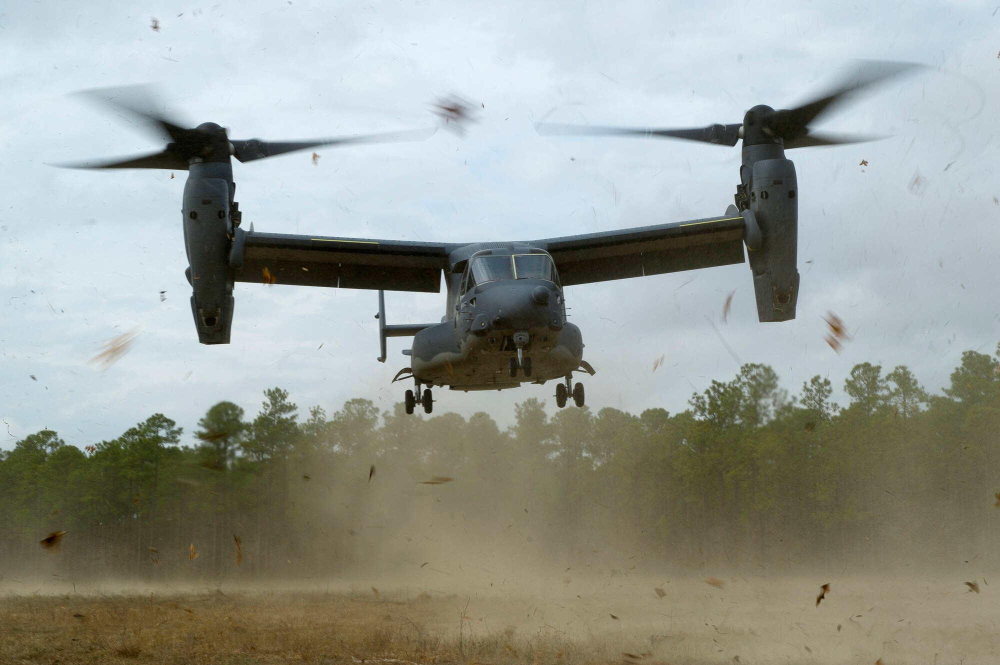 Airmen assigned to the 8th Special Operations Squadron take off in a CV-22 Osprey during a training mission Feb. 1, 2011, at Hurlburt Field, Fla. (U.S. Air Force photo/Staff Sgt. Michael B. Keller)
