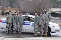 They are all smiles now! The 916th Security Forces Command Section Team earned top honors from the AMC IG. In fact, 916th Security Forces took home a team award, two outstanding performer awards and one IG coin. Great job! (USAF photo by Ms. Donna Lea, 916ARW/PA)