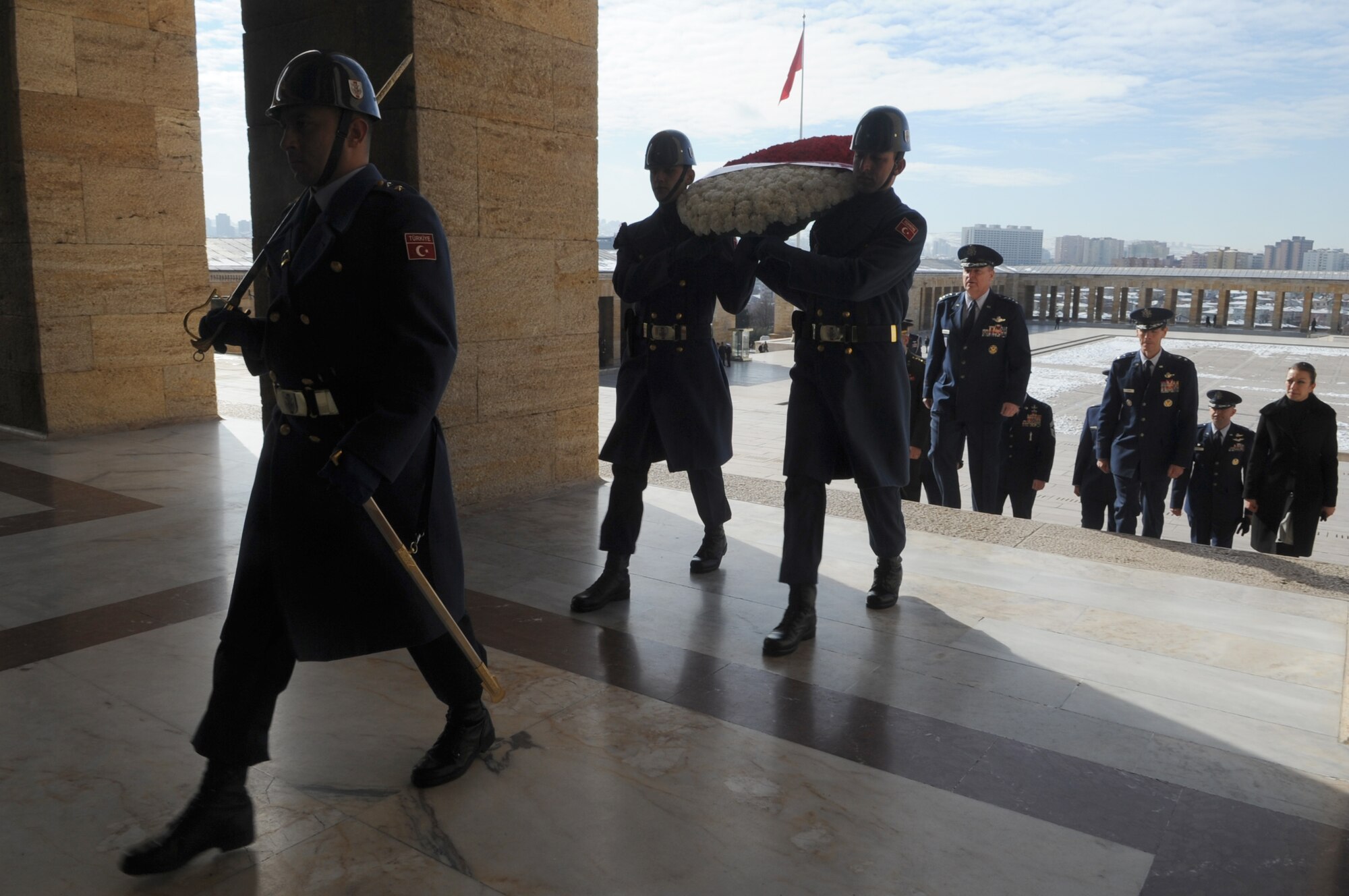 Turkish service members carry a wreath on behalf of Gen. Mark A. Welsh III, U.S. Air Forces in Europe commander, at a wreath-laying ceremony, Feb. 2, 2011, in Ankara, Turkey. The ceremony honored Mustafa Kemal Ataturk, the founder of the Republic of Turkey, and took place at Anitkabir, Ataturk’s memorial and mausoleum. Airmen from local Air Force units accompanied the general to the ceremony. (U.S. Air Force photo by Tech. Sgt. Valda Wilson/Released)