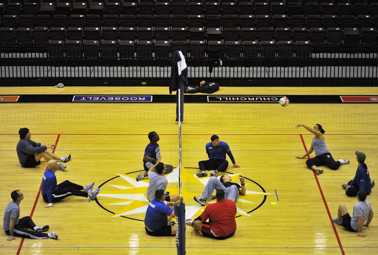 Air Force Warrior Team training camp attendees practice volleyball Feb. 9, 2011, at the Blossom Athletic Center in San Antonio, Texas. There are a total of 32 athletes invited to the 2011 Air Force Warrior Team training camp Feb. 7 through 11 in San Antonio. (U.S. Air Force photo/Staff Sgt. Desiree N. Palacios)