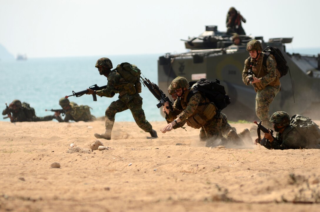 Royal Thai and U.S. Marines assualt the beach in an amphibious raid at Hat Yao, Thailand, Feb. 10, 2011. The U.S. contingent is assigned to Battalion Landing Team, 2nd Battalion, 5th Marine Regiment, 31st Marine Expeditionary Unit, 3rd Marine Expeditionary Brigade Forward, 3rd Marine Expeditionary Force.