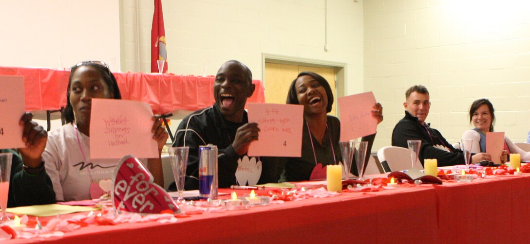 MARINE CORPS BASE CAMP LEJEUNE, N.C. – Couples made faces, laughed and smiled during the “Not-So-Newlywed Game” event hosted by Marine Corps Community Services Tarawa Terrace Community Center aboard Marine Corps Base Camp Lejeune, Feb 11. The game night was the first adult event that TTCC has hosted. (U.S. Marine Corps photo by Pvt. Nik S. Phongsisattanak)