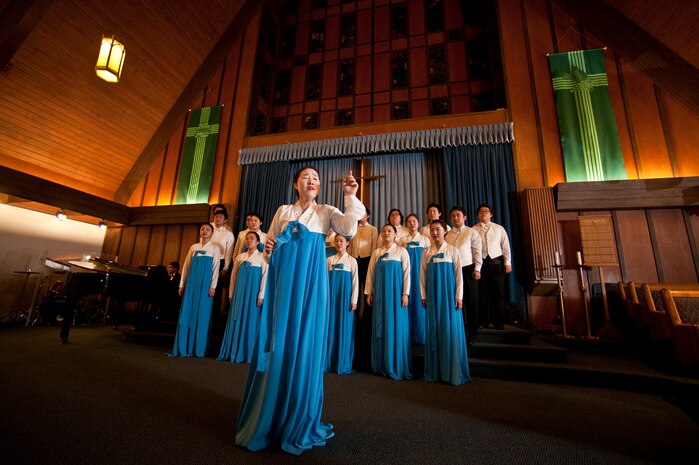 NELLIS AIR FORCE BASE, Nev. --  Wonhae Song a Junior at Chu Gae University in Seoul, South Korea, performs at the base chapel Feb. 10. Ms.Song is a member of the Korean Students Glee Club which was established in 1966 and is composed of college students studying music in various universities in the Seoul metropolitan area. (U.S. Air Force photo by Tech. Sgt. Michael R. Holzworth)
