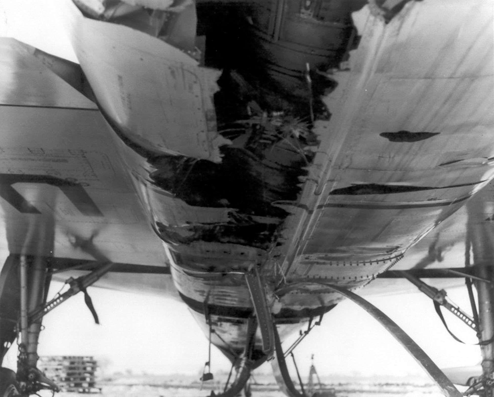 PLANE LANDS ITSELF AFTER PILOT EJECTS - This F-106A (S/N 58-0787) was involved in an unusual incident. During a training mission, it entered an flat spin forcing the pilot to eject. Unpiloted, the aircraft recovered on its own and miraculously made a gentle belly landing in a snow-covered field. (U.S. Air Force photo)