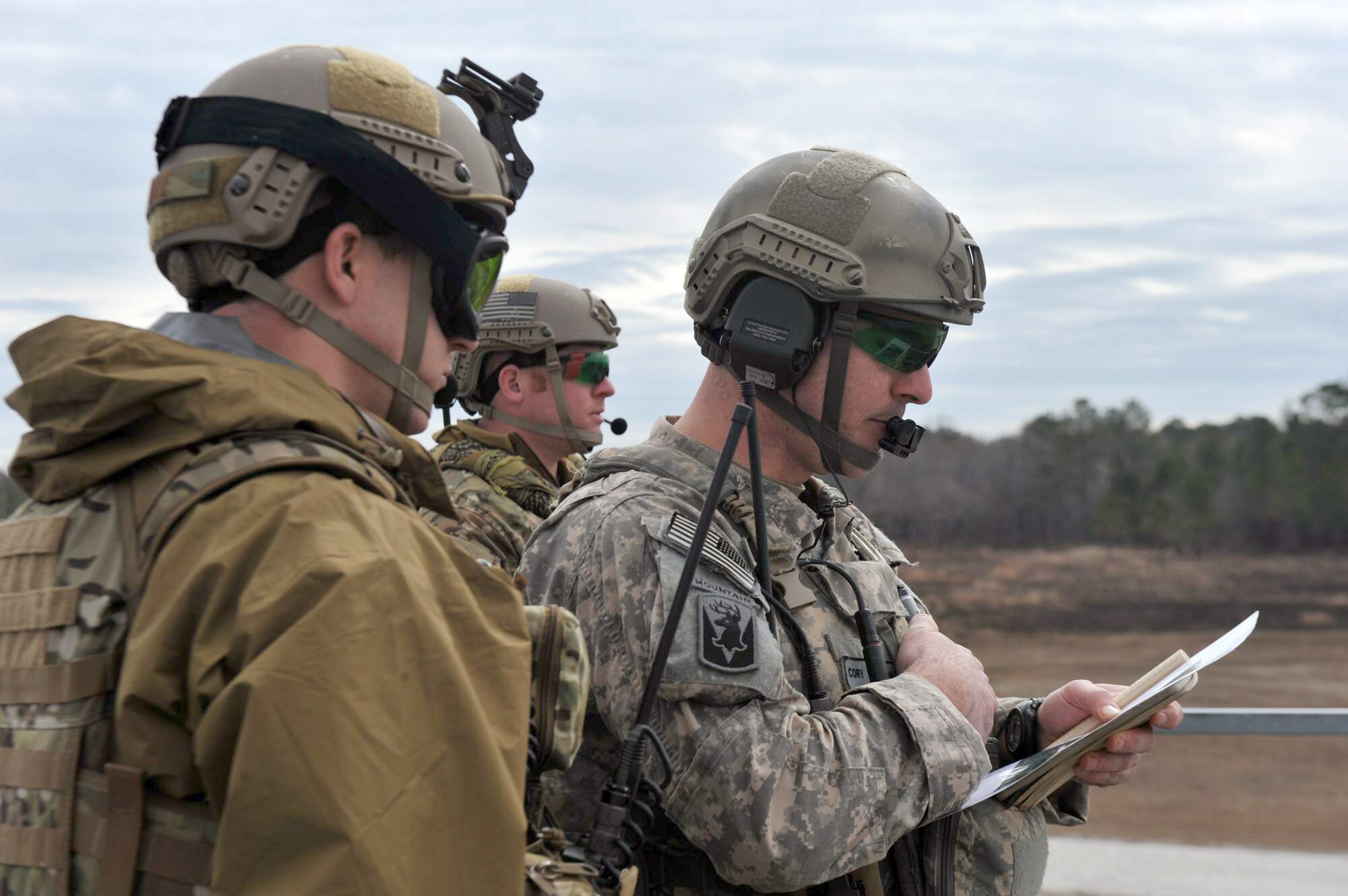 Staff Sgt. Cory Welton performs his duties as a joint terminal attack controller Feb. 3, 2011, during a National Guard Bureau joint quarterly training exercise at Camp Townsend, Ga.  Sergeant Welton is based out of Camp Murray, Wash. (U.S. Air Force photo/Staff Sgt. Desiree N. Palacios)