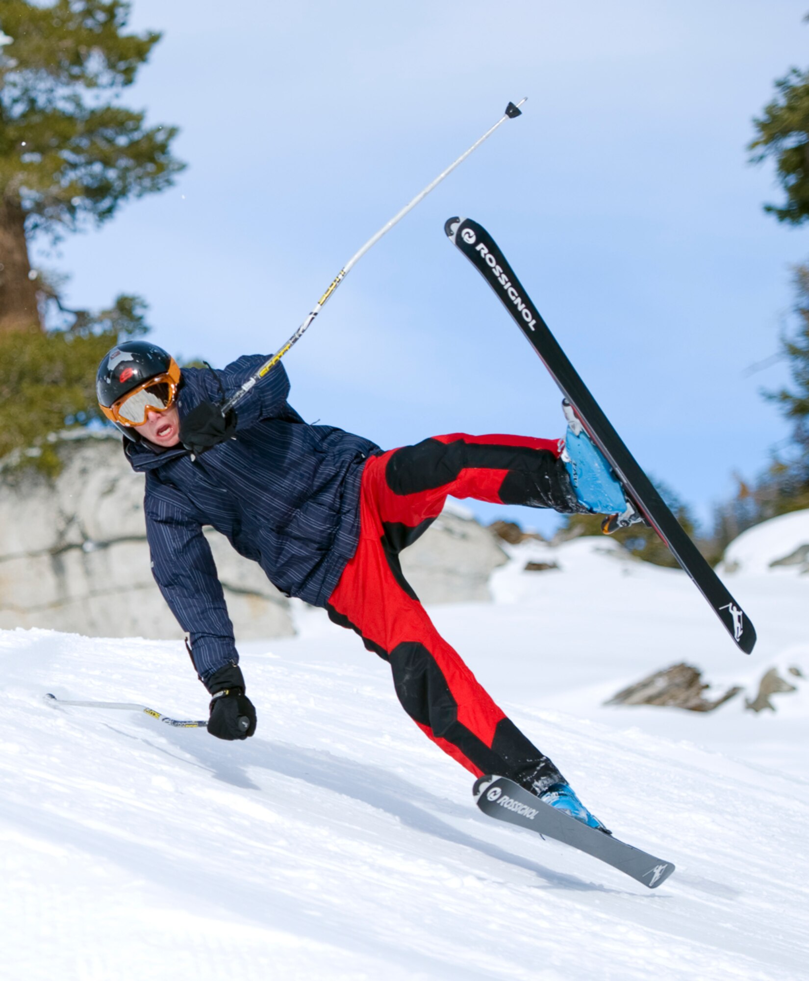 Cutting too sharply immediately after a jump, a skier loses control just before he crashes into a snow bank.
(Photo by TSgt Samuel Bendet)