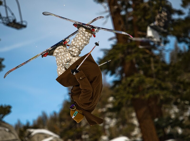 A SLIPPERY SLOPE - A skier at Heavenly Ski Resort, South Lake Tahoe, Nev., successfully lands a back flip on one of the resort?s terrain parks. With no helmet, he is taking his life into his own hands performing such aerobatics over a rough landscape. (photo by TSgt Samuel Bendet)