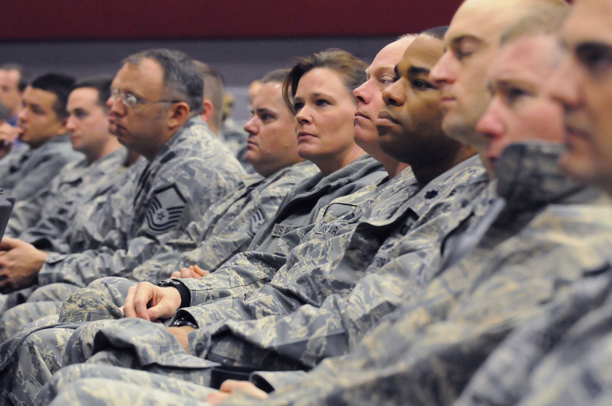 Members of the 5th Combat Communications Group listen to a presentation about the suicide of Airman 1st Class Austin Gates-Benson. Airman Gates-Benson served with the 54th CBCS. (U.S. Air Force photo/Sue Sapp) 