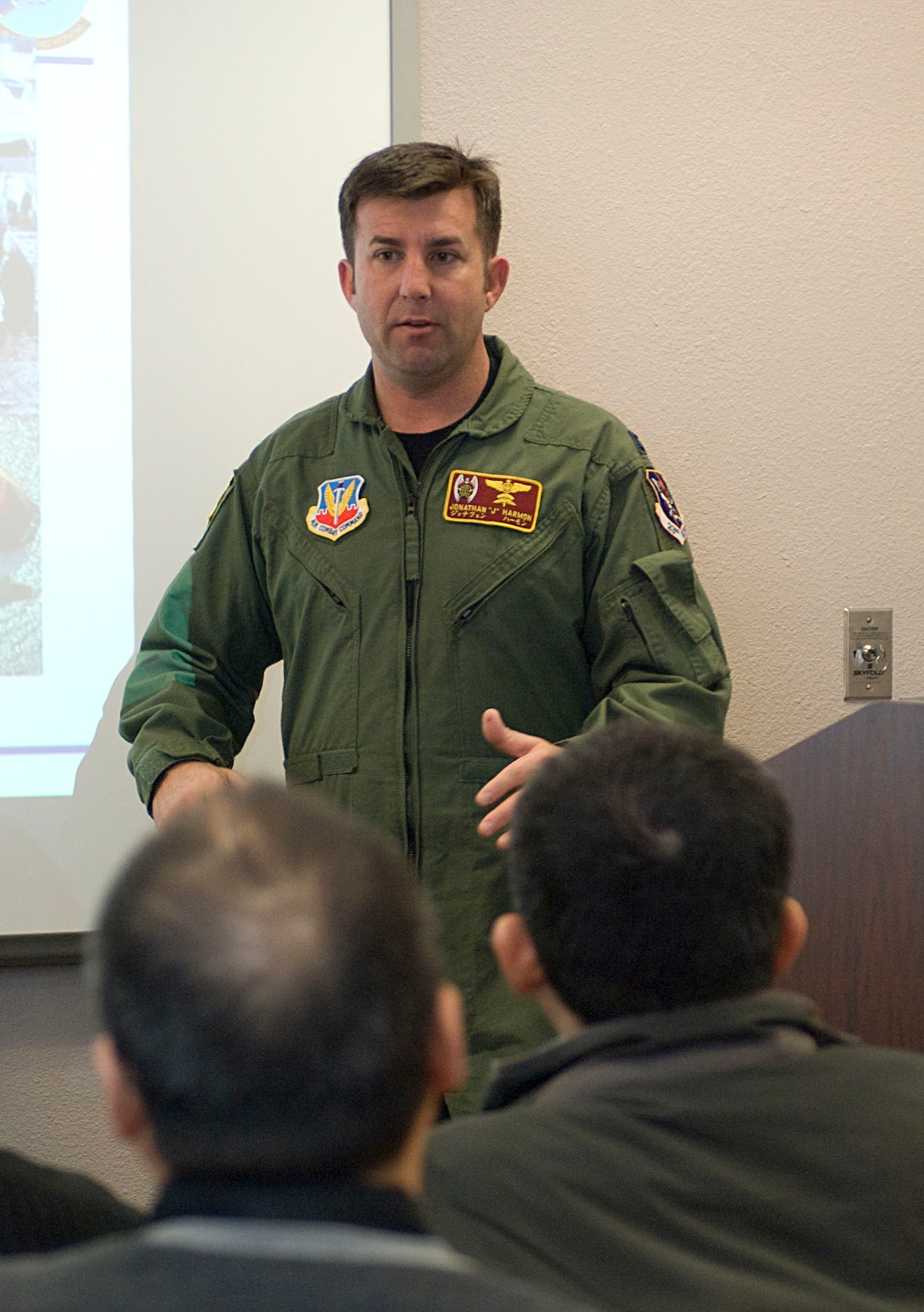 NELLIS AIR FORCE BASE, Nev.-- Capt. Jonathan Harmon, 58th Rescue Squadron assistant director of operations, briefs individuals involved with the chaplain recruiting program Feb. 10.  The program allows individuals interested in becoming chaplains for the U.S Air Force to visit the base and experience daily operations. (U.S Air Force photo by Senior Airman Stephanie Rubi / Released) 