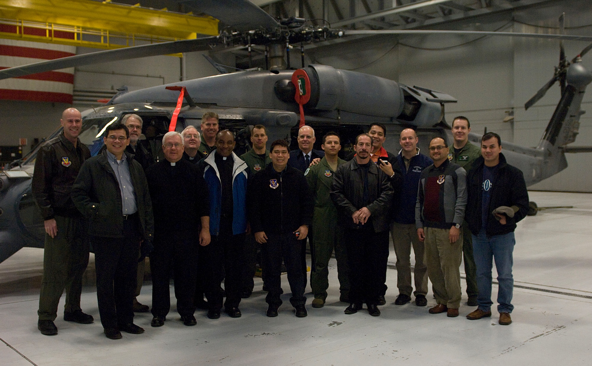 NELLIS AIR FORCE BASE, Nev. -- Members from the 58th and 66th Rescue Squadrons pose with chaplain recruits for a group photo Feb 10.  The Chaplain's Recruiting program allows individuals interested in becoming chaplains for the U.S Air Force to visit the base and experience daily operations.
(U.S Air Force photo by Senior Airman Stephanie Rubi) 