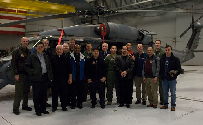 NELLIS AIR FORCE BASE, Nev. -- Members from the 58th and 66th Rescue Squadrons pose with chaplain recruits for a group photo Feb 10.  The Chaplain's Recruiting program allows individuals interested in becoming chaplains for the U.S Air Force to visit the base and experience daily operations.
(U.S Air Force photo by Senior Airman Stephanie Rubi) 
