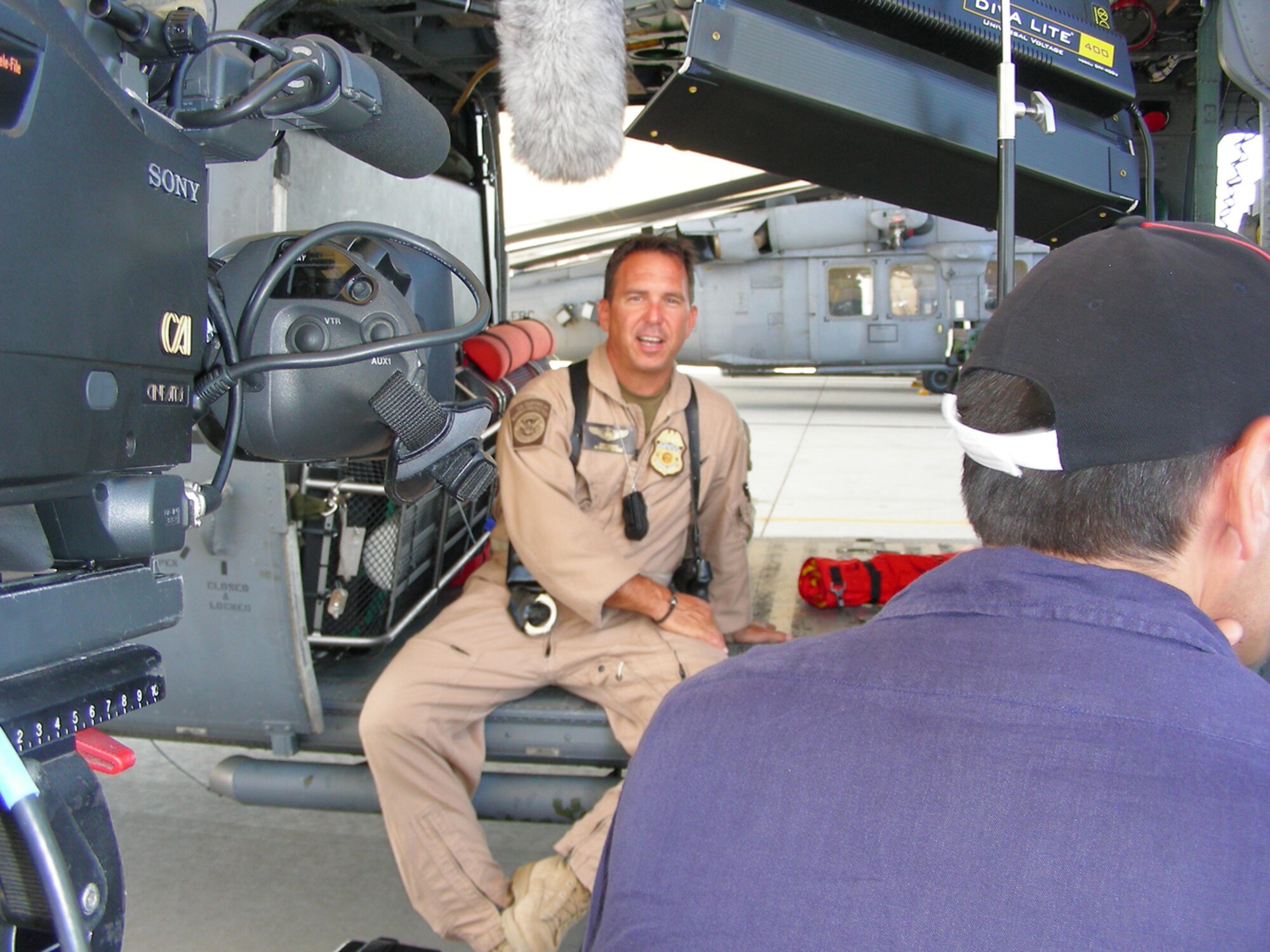 DAVIS-MONTHAN AIR FORCE BASE, Ariz. - Air Force Reserve Airmen from the 920th Rescue Wing, Patrick Air Force Base, Fla., as well as from their geographically separated unit, the 943rd Rescue Group here, are featured for their heroics in a newly released documentary titled, ?The Taliban Gambit,? which will be airing on the Smithsonian Channel throughout December 2010.  Shown here, the London-based Windfall film team, film various scenes in the Tuscon desert in July 2008. (U.S. Air Force photo/Capt. Cathleen Snow)