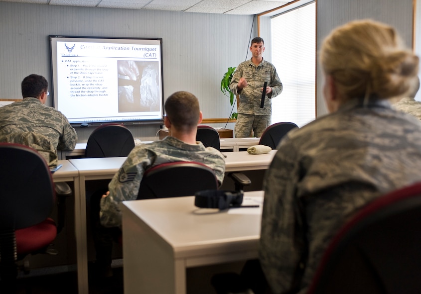 Staff Sgt. Joseph Moniz, a self-aid and buddy care instructor with the 2nd Logistics Readiness Squadron, teaches a class for Airmen who are deploying soon on Barksdale Air Force Base, La., Feb. 11. Self-aid and buddy care is a first-aid class that is a required element of the pre-deployment training for all Airmen. (U.S. Air Force photo/Senior Airman Chad Warren)(RELEASED)