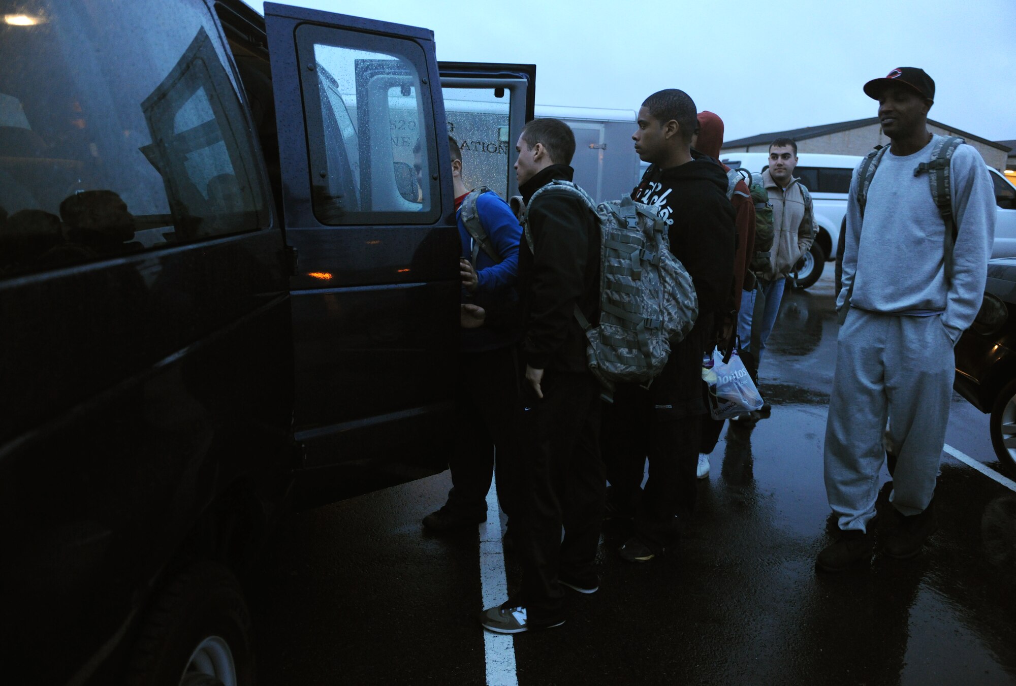MOODY AIR FORCE BASE, Ga. -- Airmen from the 823rd Base Defense Squadron load a van as they leave to Fort Bragg, N.C., to participate in a joint forces exercise Feb. 10. The 823rd BDS members will drive to N.C., stay for the three-day exercise and then will return to Moody.  (U.S. Air Force photo/Airman 1st Class Benjamin Wiseman)(RELEASED)