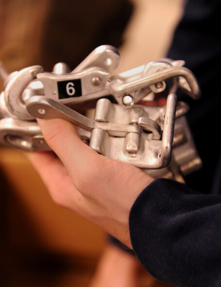 MOODY AIR FORCE BASE, Ga. -- Quick releases are counted before members of the 823rd Base Defense Squadron leave to conduct a joint forces exercise at Fort Bragg, N.C., Feb. 10. All equipment was checked twice to ensure nothing was left behind. (U.S. Air Force photo/Airman 1st Class Benjamin Wiseman)(RELEASED)