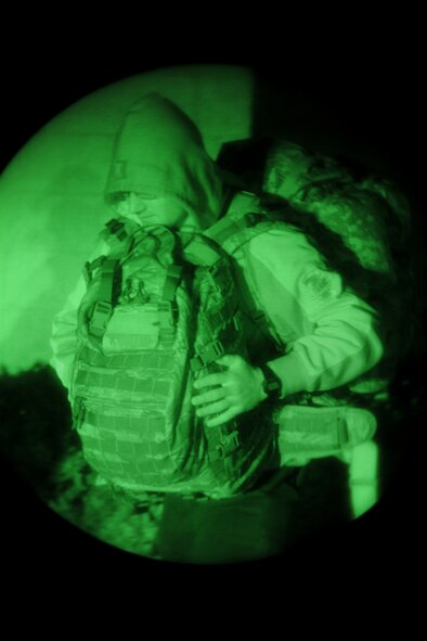 MOODY AIR FORCE BASE, Ga. -- Airman 1st Class Ryan Godar, 823rd Base Defense Squadron fire team member, carries his gear to a van before leaving to conduct a joint forces exercise with the U.S. Army’s 3rd Brigade Combat Team Feb. 10. Airmen from the 823rd arrived at the base early to pack their gear in preparation for the exercise. (U.S. Air Force photo/Airman 1st Class Benjamin Wiseman)(RELEASED)