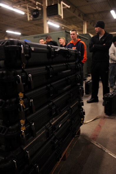 MOODY AIR FORCE BASE, Ga. -- Pelican cases sit as members of the 823rd Base Defense Squadron prepare to leave for a joint force exercise at Fort Bragg, N.C., Feb. 10. The 823rd BDS will be joining the U.S. Army’s 3rd Brigade Combat Team to assist as a jump follow-on team for the airfield seizure exercise. (U.S. Air Force photo/Airman 1st Class Benjamin Wiseman)(RELEASED)