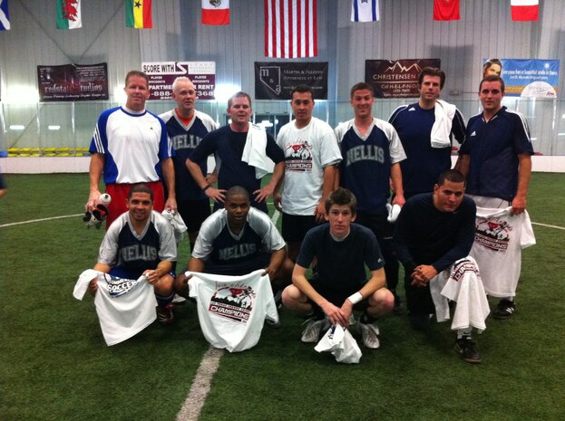 The Nellis Fitness Center sponsored soccer team poses for a photo after winning the league championship Jan. 23. The players in the front row from left to right are; Greg Posada, Paul Prosper, Brandon Rowe, Noe Andrade. The players in the back row from left to right are; Jim Rowe, Dan Churchwell, Jeff Snider, Andy Alvarez, Alexander Clark, Jonathan Siesholtz, Justin Crawford. 