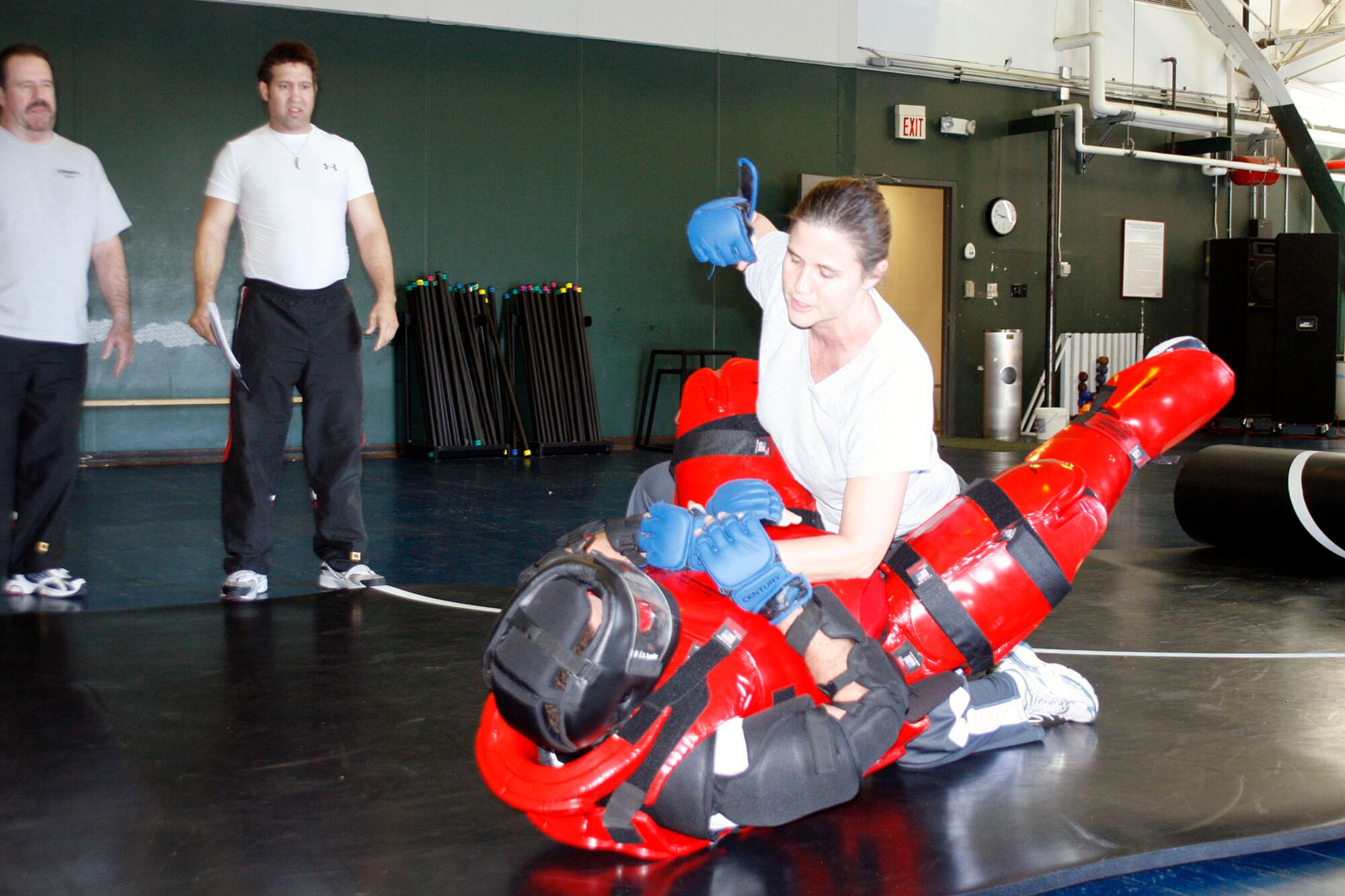After an aggressor got Debb Charlton in a choke hold, she was able to break it and then flip him and throw a punch. (Air Force photo by Becky Pillifant)