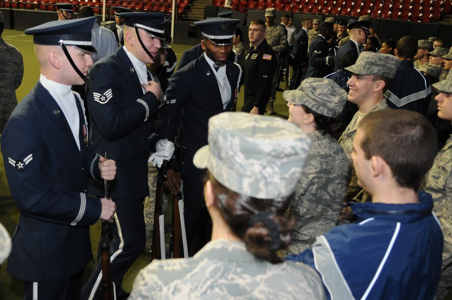 Members of The U.S. Air Force Honor Guard drill team answer the University of Maryland University Air Force ROTC cadet’s questions after their performance Feb. 10 at the UMU campus in College Park, Md. The USAF Honor Guard drill team participated in the performance to inspire the future leaders of the Air Force. (U.S. Air Force photo by Senior Airman Christopher Ruano)