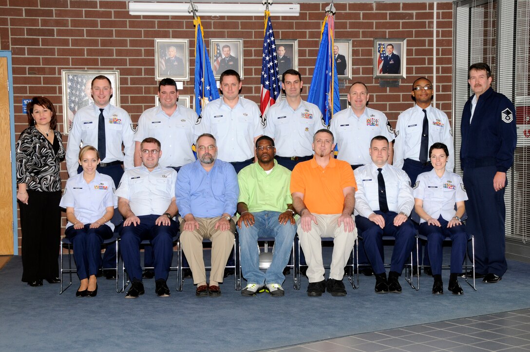 McGHEE TYSON AIR NATIONAL GUARD BASE, Tenn. -- The students and instructors of the Air National Guard Instructor Certification Program Class 2011-2 gather at The I.G. Brown Air National Guard Training and Education Center here, Feb. 7, 2011.  Pictured L-R (standing) Tammie Smeltzer; Tech. Sgt. Gregory Klama; Master Sgt. Peter Piscopio; Master Sgt. Gregory Boutelle; Senior Master Sgt. Shaun Withers; Master Sgt. Paul Mann; Senior Airman Jamie Boudreaux; Master Sgt. Mike Copeland; L-R (sitting) Staff Sgt. Jessica Wolbert; Tech. Sgt. Jeremy Burns; Vaughn Witt; Brandon Joseph; Jeremy Hinkel; Staff Sgt. Christopher Hancock; Tech. Sgt. Marcie Mascaro. (U.S. Air Force photo by Master Sgt. Kurt Skoglund/Released)