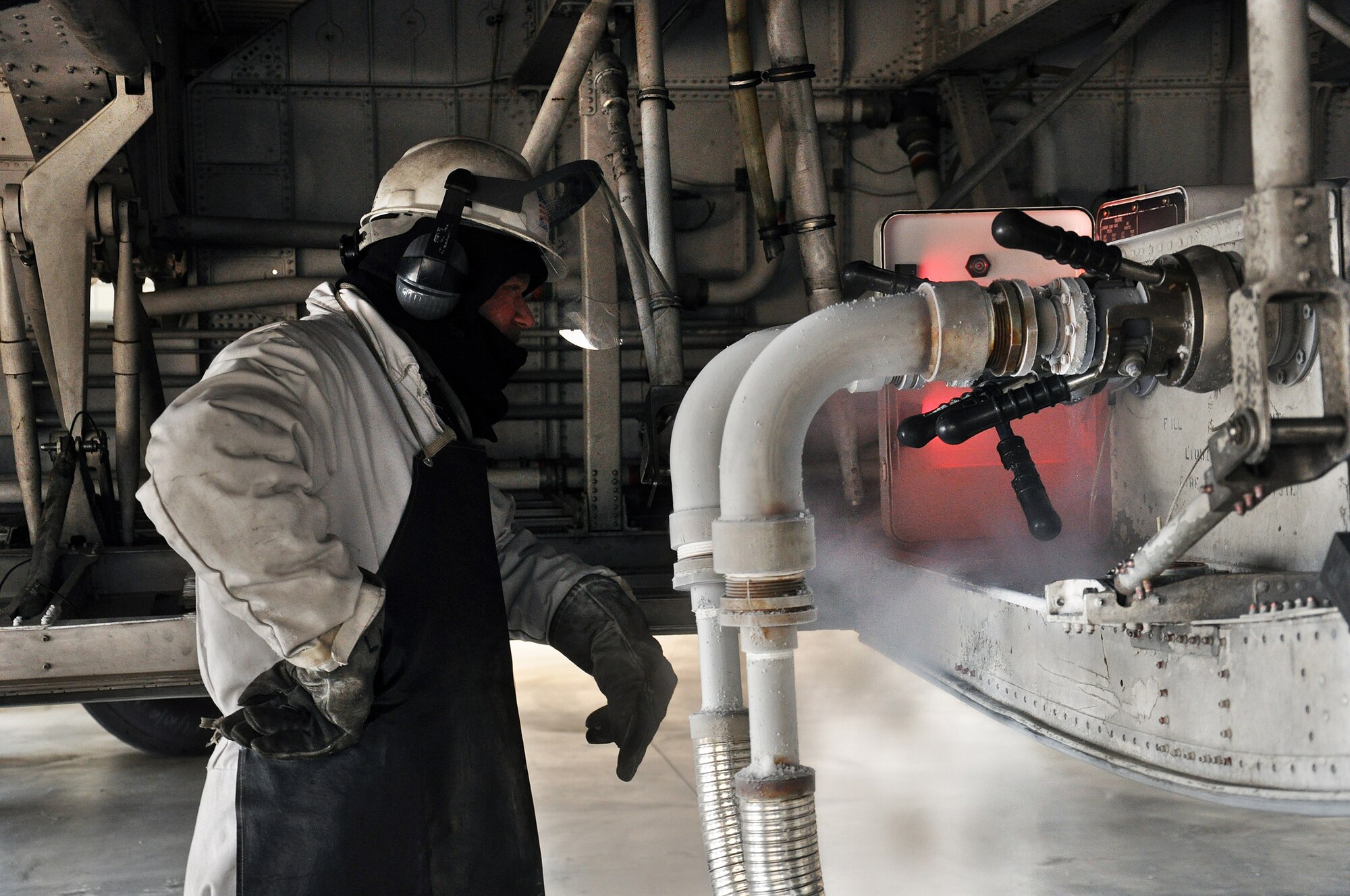 WRIGHT-PATTERSON AIR FORCE BASE, Ohio - Tech. Sgt. Charles Everett, 445th Maintenance Squadron, monitors the liquid nitrogen (LN2) servicing panel for correct airplane pressure, ensuring the proper quantity of LN2 is filled. (U.S. Air Force photo/Senior Airman Mikhail Berlin)