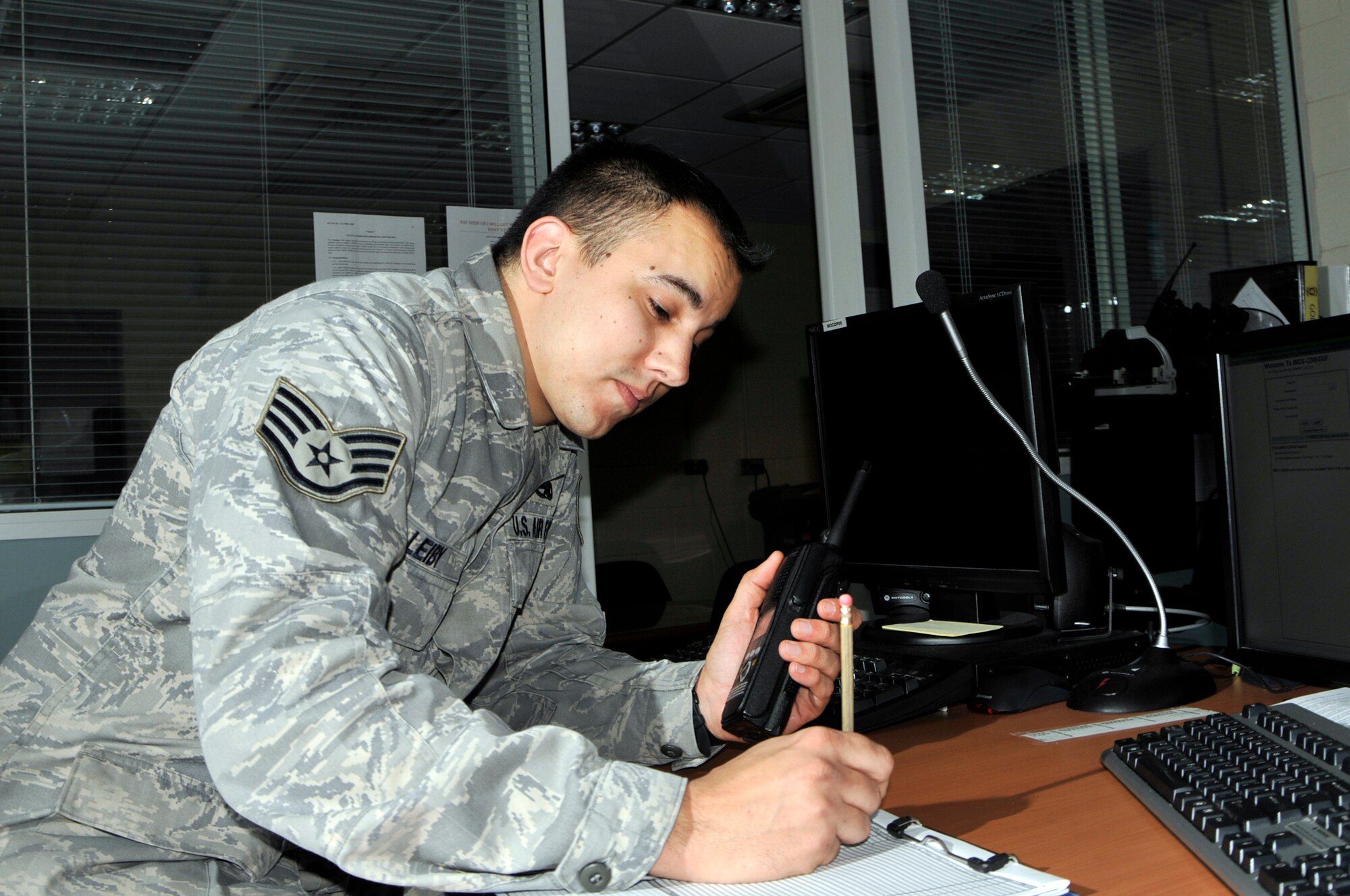 ROYAL AIR FORCE LAKENHEATH, England -- Staff Sgt. Alan Leiby, 48th Maintenance Operations Squadron maintenance operations center senior controller, coordinates incoming maintenance action requests Feb. 9. Sergeant Leiby was nominated for a Liberty Spotlight because he demonstrates the core value of "Excellence in All We Do." (U.S. Air Force photo/Airman Cory Payne)