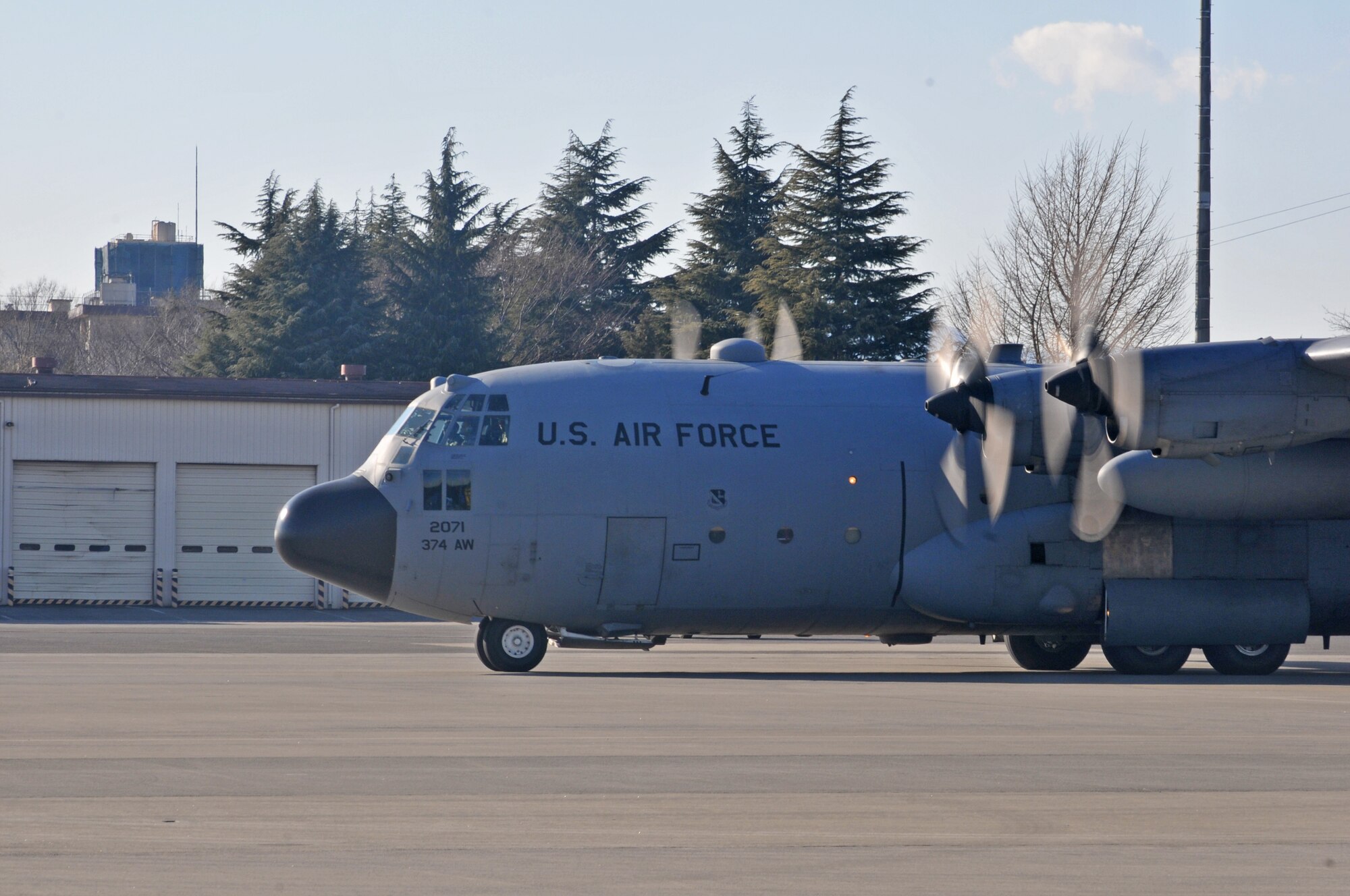 YOKOTA AIR BASE, Japan -- A C-130 Hercules from the 374th Airlift Wing prepares to depart Yokota Feb. 1, for Andersen Air Base, Guam, in support of the Cope North exercise.Cope North is a bilateral exercise conducted with both U.S. and Japanese military personnel. (U.S. photo/Airman 1st Class Krystal M. Garrett)

