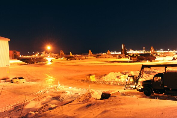 KULIS AIR NATIONAL GUARD BASE, Alaska - Members of 176th Aircraft Maintenance Squadron prepare five C-130s from the 144th Airlift Squadron and two HC-130s from the 211th Rescue Squadron for a ceremonial flight from Kulis to Joint Base Elmendorf-Richardson, Feb. 12, 2011. The 176th Wing is relocating from Kulis to Joint Base Elmendorf-Richardson per the 2005 Defense Base Closure and Realignment proposal.  Alaska Air National Guard photo by Master Sgt. Shannon Oleson.