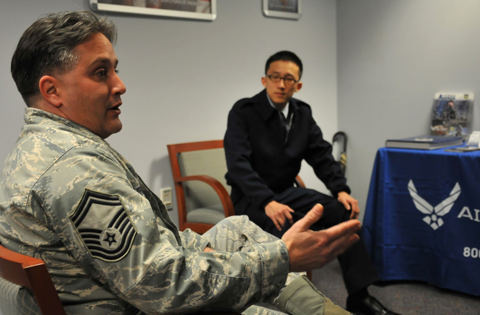 JOINT BASE LEWIS MCCHORD, Wash. -- Senior Master Sgt. Scott Terpening talks up the Air Force Reserve with AFJROTC students from Todd Beamer High School in Federal Way, Wash.  Sergeant Terpening is the senior recruiter for the 446th Airlift Wing and his office has seen a huge number of increases in prospective leads, thanks in large part to the testimonials of fellow Reservists, and the Get 1 Now program. (U.S. Air Force photo/Staff Sgt. Grant Saylor) 
