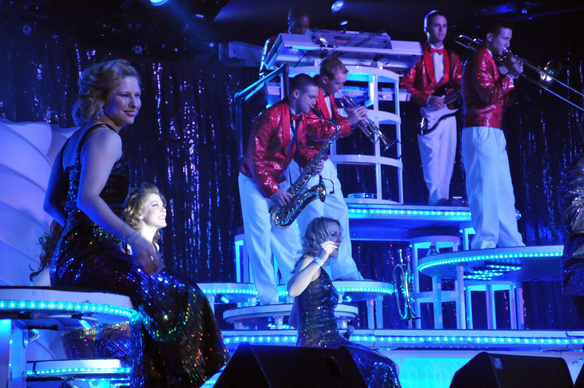 Tops In Blue raised the roof at McChord Field here, on Feb. 12. The 2010 tour, entitled "We Believe" is a salute to the American ideals and featured R&B music from Stevie Wonder, the swingin' sounds of Michael Buble, Montgomery Gentry's all-American country music, hits by the Black-Eyed Peas, Lady Gaga and much more.  