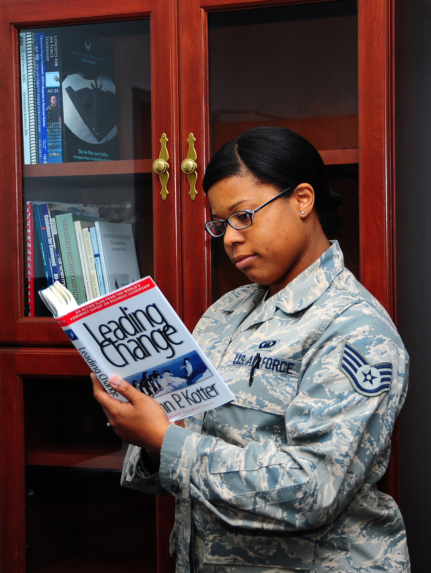 Staff Sgt. Shanika Frontz, chaplain assistant for the 403rd Wing, takes advantage of the new leadership library by reading a book on leadership.  