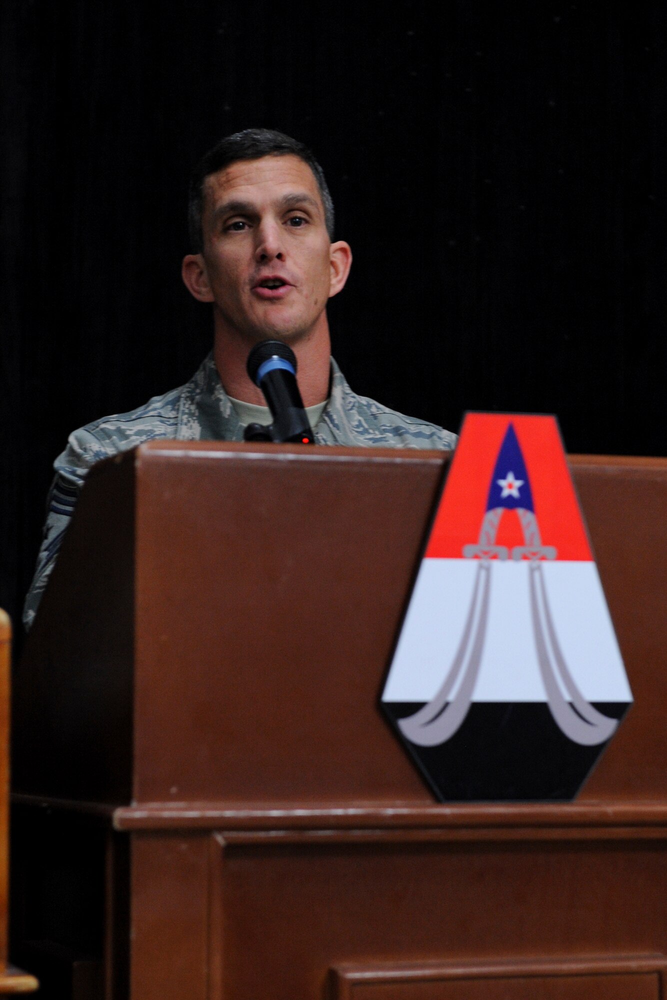 Chief Master Sgt. Richard Parsons, U.S. Air Forces Central command chief, speaks at the 321 Air Expeditionary Wing’s Annual Awards ceremony Feb. 11 at Al Faw Palace on the Victory Base Complex, Baghdad.  Chief Parson’s speech focused on the Air Force Core Values. (U.S. Air Force Photo by Staff Sgt. Levi Riendeau)