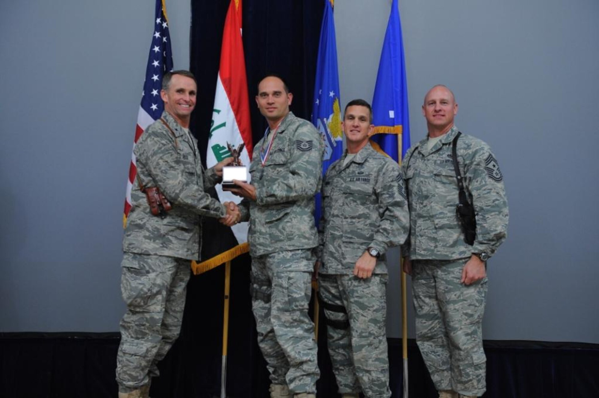 The 2010 Noncommissioned Officer of the Year is Tech. Sgt. Paul Kinsey, 321st Expeditionary Mission Support Advisory Group.  Sergeant Kinsey (second from left) is the Non-commissioned Officer in Charge, Lead Communications Advisor, he led the wing’s best badge program and was proactive in inventorying 166 rooms in less than two days, enabling the transfer to the Base Transition Team and keeping the Iraqi Air Force bed down plan on track.  Sergeant Kinsey was an outstanding Basic Life Support mentor and ensured training plans were followed.  He guided 27 Iraqi Airmen on H2O generator support, ensuring 39 buildings and 438 IqAF members were ready to host incoming Iraqi Security Forces.  (U.S. Air Force Photo by Staff Sgt. Levi Riendeau)