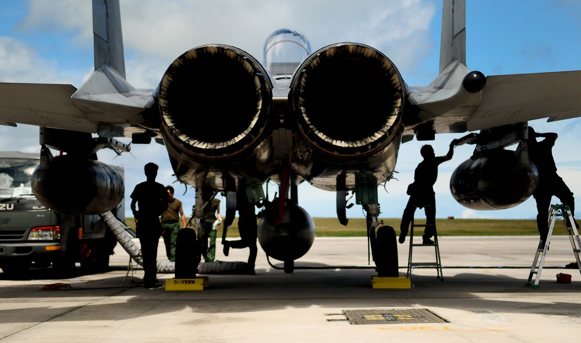 ANDERSEN AIR FORCE BASE, Guam - Japan Air Self-Defense Force maintainers perform post-flight maintenance  on  an F-15 Eagle after its arrival here Feb. 11, for the exercise Cope North 11-1. Cope North is a bilateral flying exercise between the U.S. Air Force, U.S. Navy and JASDF, improving interoperability between the two nations through two weeks of aerial scenarios. (U.S. Air Force photo/ Airman 1st Class Jeffrey Schultze)