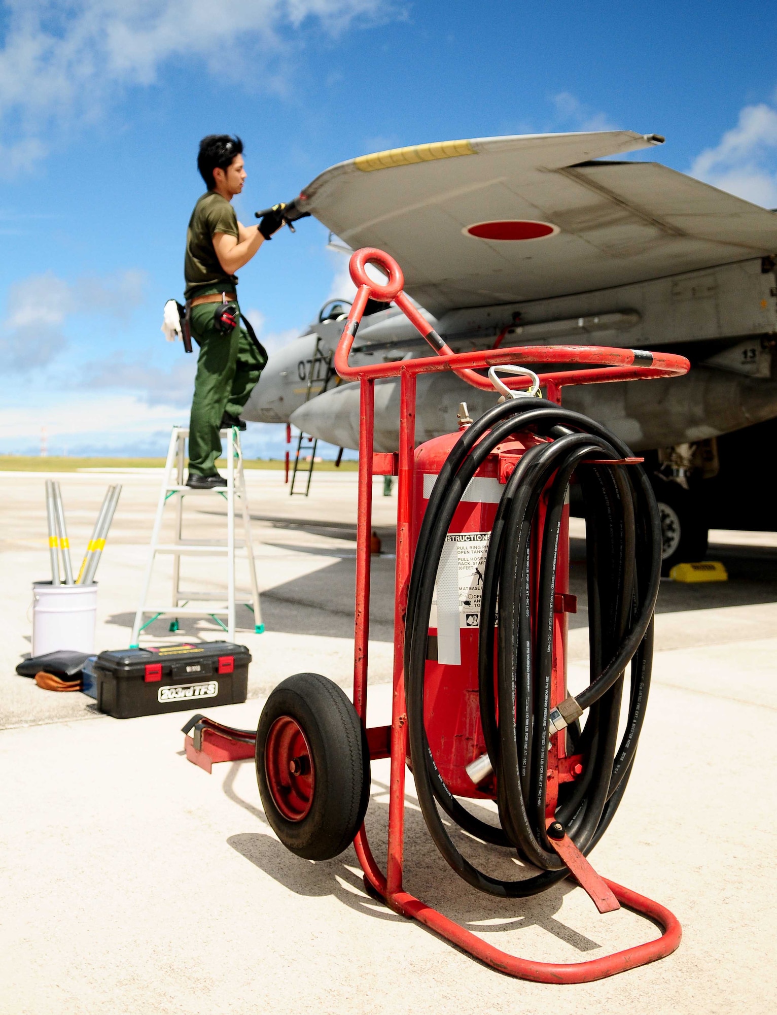 ANDERSEN AIR FORCE BASE, Guam - A Japan Air Self-Defense Force maintainer performs post-flight maintenance on an F-15 Eagle after its arrival here Feb. 11, for the exercise Cope North 11-1. Cope North is a bilateral flying exercise between the U.S.  Air Force, U.S. Navy and JASDF, improving interoperability between the two nations through two weeks of aerial scenarios. (U.S. Air Force photo/ Airman 1st Class Jeffrey Schultze)