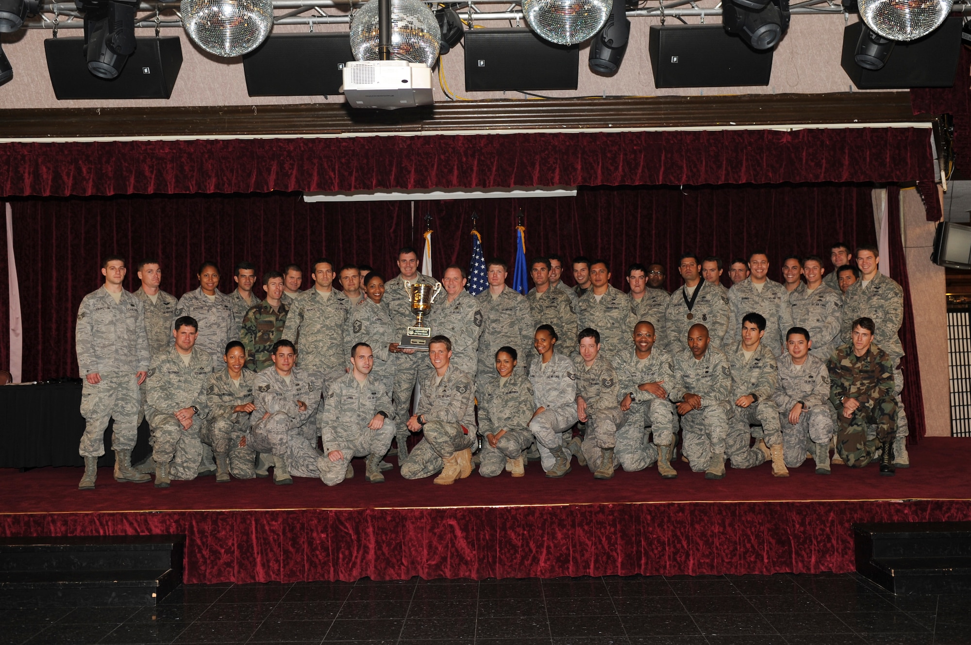 KADENA AIR BASE, Japan -- Members of the 320th Special Tactics Squadron pose for a photo with a 353rd Special Operations Group Squadron of the Year trophy after receiving the honor at the group's 2010 Annual Awards Luncheon here Feb. 10. (U.S. Air Force photo by Staff Sgt. Jonathan Steffen)