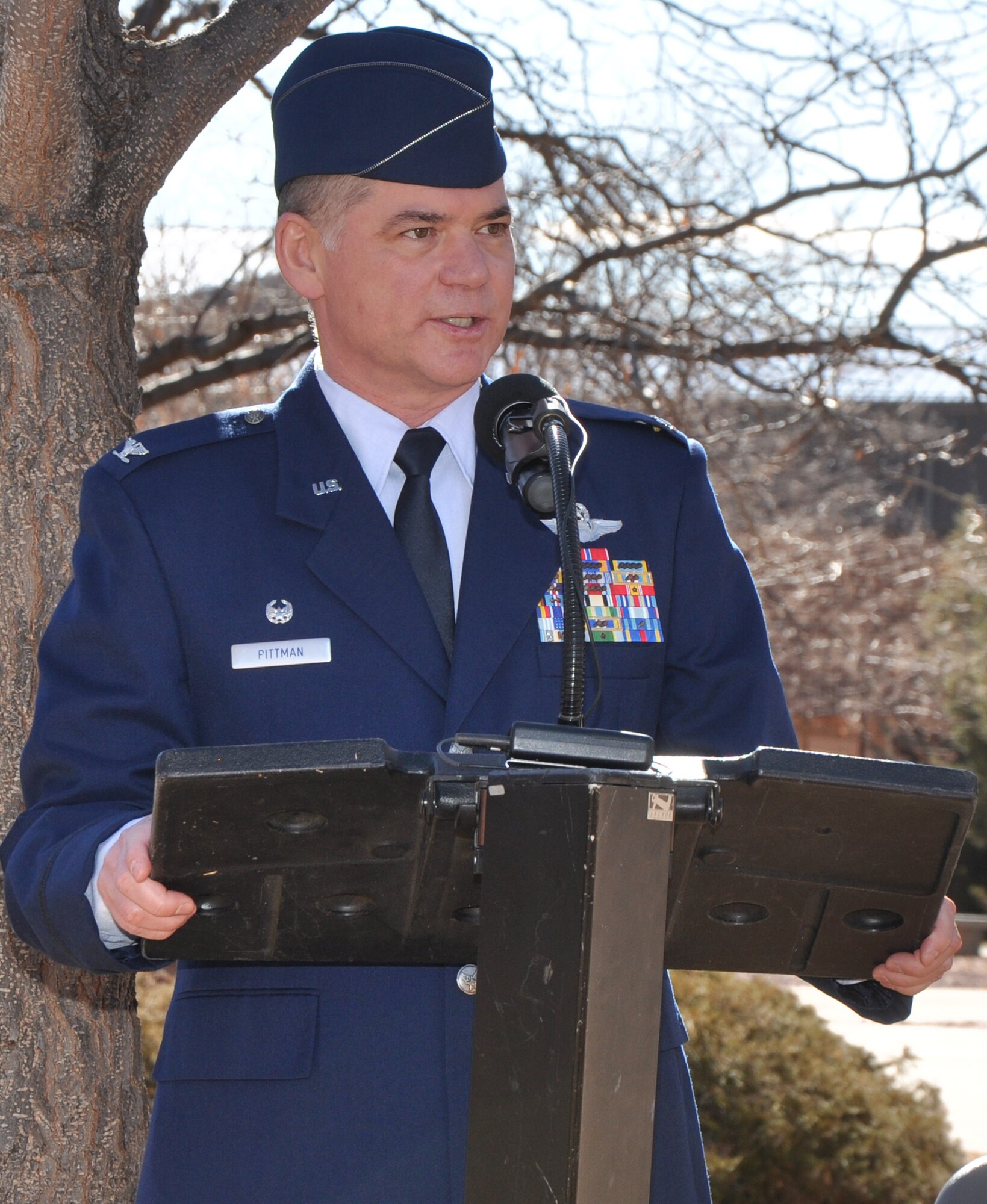 Col. Jack H. Pittman Jr., Commander 302nd Airlift Wing, addresses the audience during a ground breaking ceremony at Peterson Air Force Base, Colo., February 14 for a new Total Force Integration C-130 squadron operations facility. The new building will become the center piece of the Air Force Reserve Command and Air Mobility Command's new Total Force Integration campus at Peterson AFB. (U.S. Air Force photo/Tech Sgt. Daniel Butterfield)