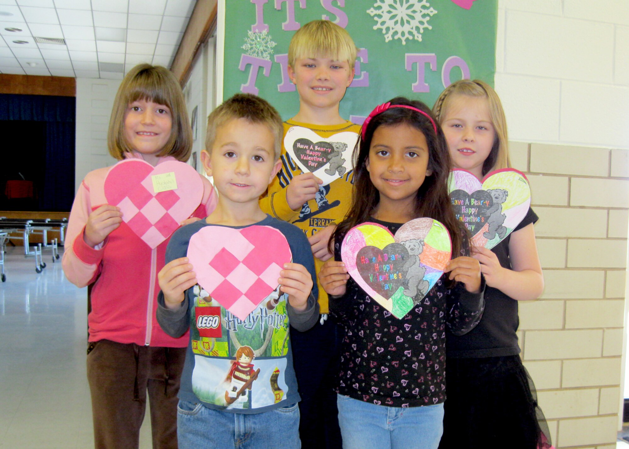 ALTUS AIR FORCE BASE, Okla. -- Representing students from Mendel L. Rivers Elementary school "Valentines for Veterans" program, Jackson Maddox, Jayden Joyce, Isabell Barker, Jason Elder, and Savannah Tubbs display hand made valentines. The valentines were delivered to local veterans by active duty volunteers Feb. 14. (Courtesy photo)
