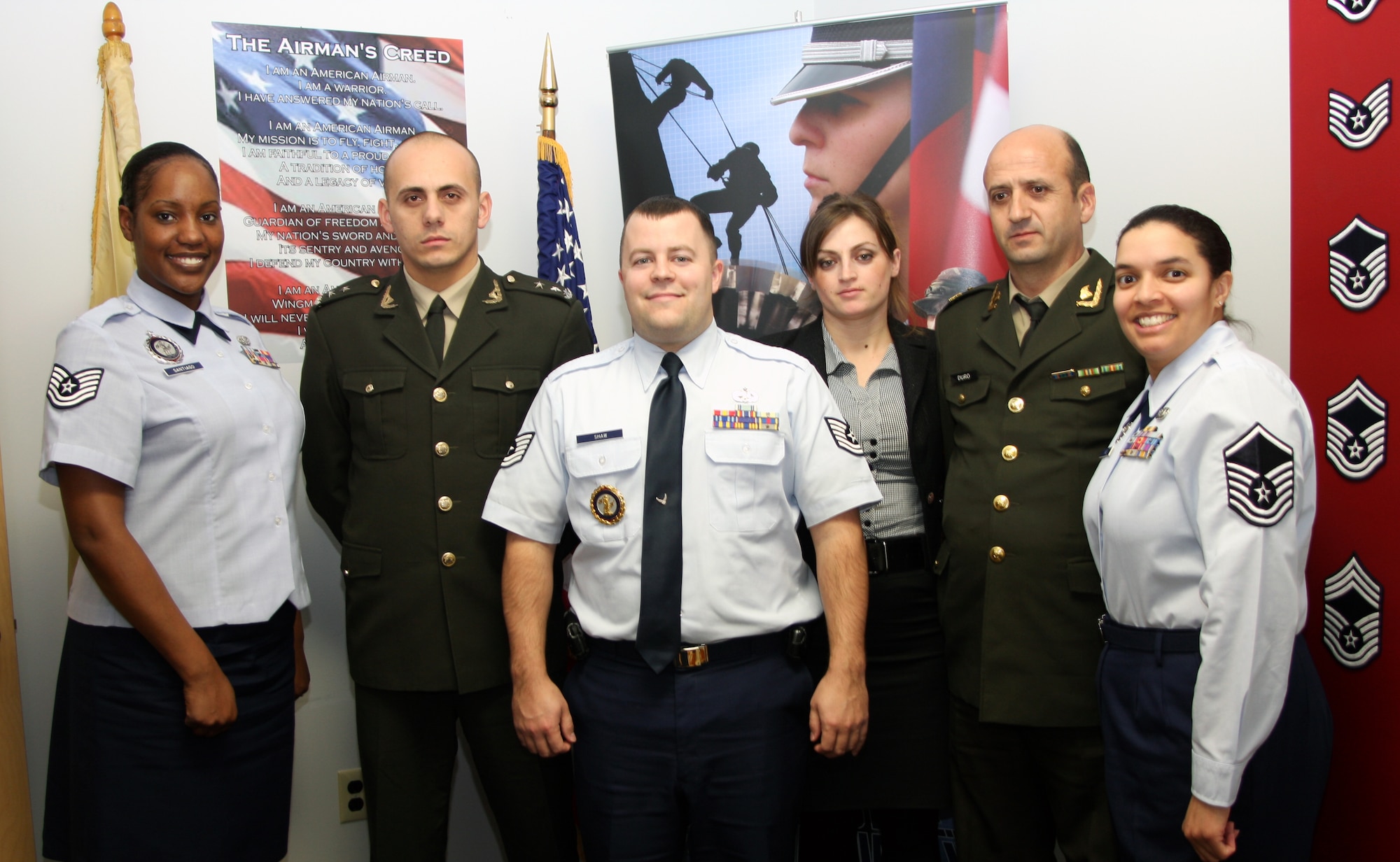 Members of the Albanian military recruiting team pose for a photo with recruiters from the 108th Wing at Joint Base McGuire-Dix-Lakehurst, N.J., Jan. 26. From left to right are Tech. Sgt. Lakisha Santiago, 1st Lt. Eugert Hoxha, Tech. Sgt. Chris Shaw, Ms. Marsela Sinjari, Maj. Roland Dura, and Master Sgt. Rebecca Kane. (U.S. Air Force photo by Staff Sft. Armando Vasquez, NJDMAVA/PA)