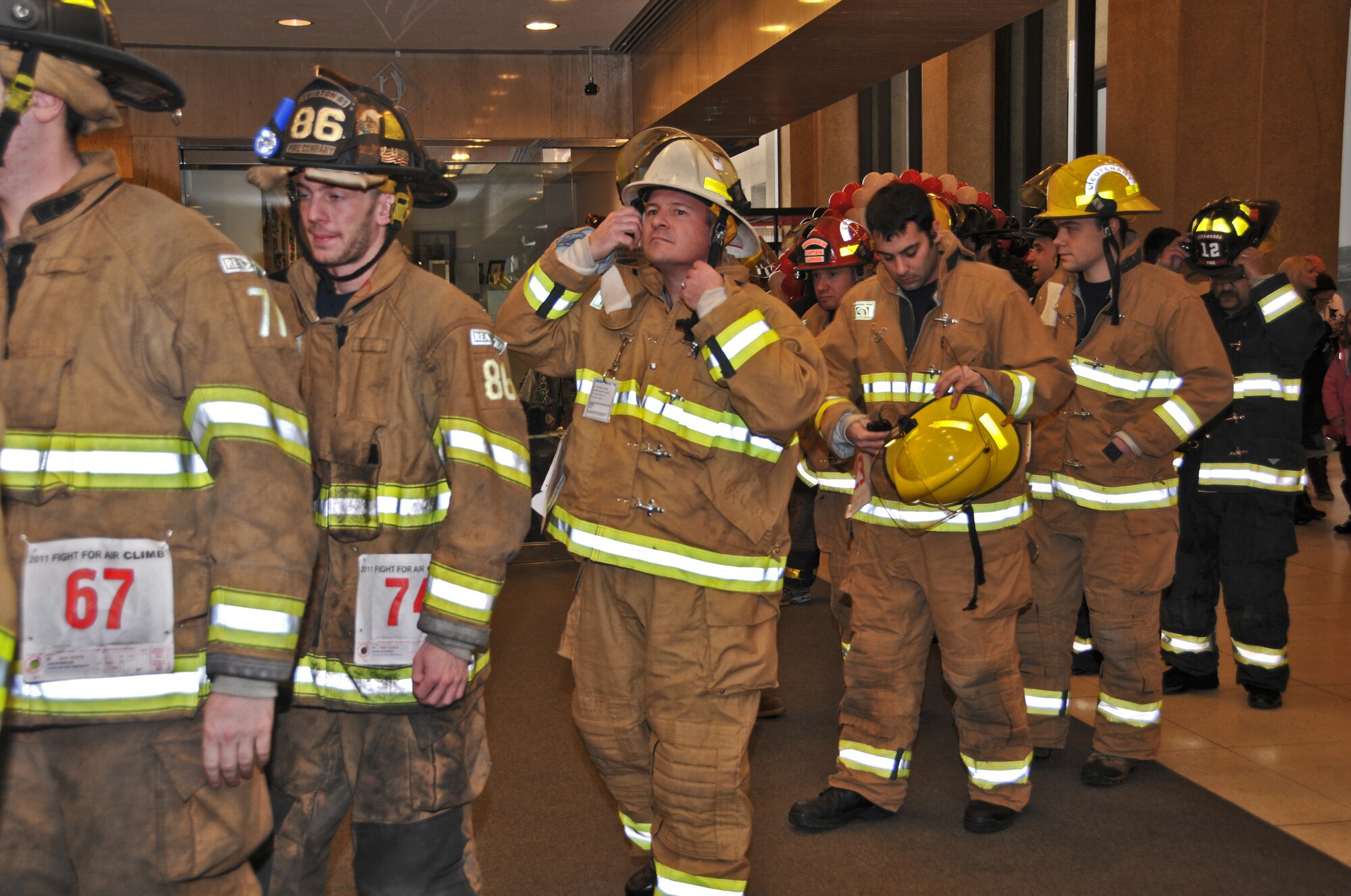 Niagara Falls Air Reserve Station Firefighters take part in the "Fight for Air Climb in Buffalo" hosted by the New York State Chapter of the American Lung Association, Saturday February 12, 2011, HSBC Center, Buffalo, NY. The NY chapter of the American Lung Association uses events like this to increase awareness of lung disease in NY and across the country. (U.S. Air Force photo by Staff Sgt. Joseph McKee)