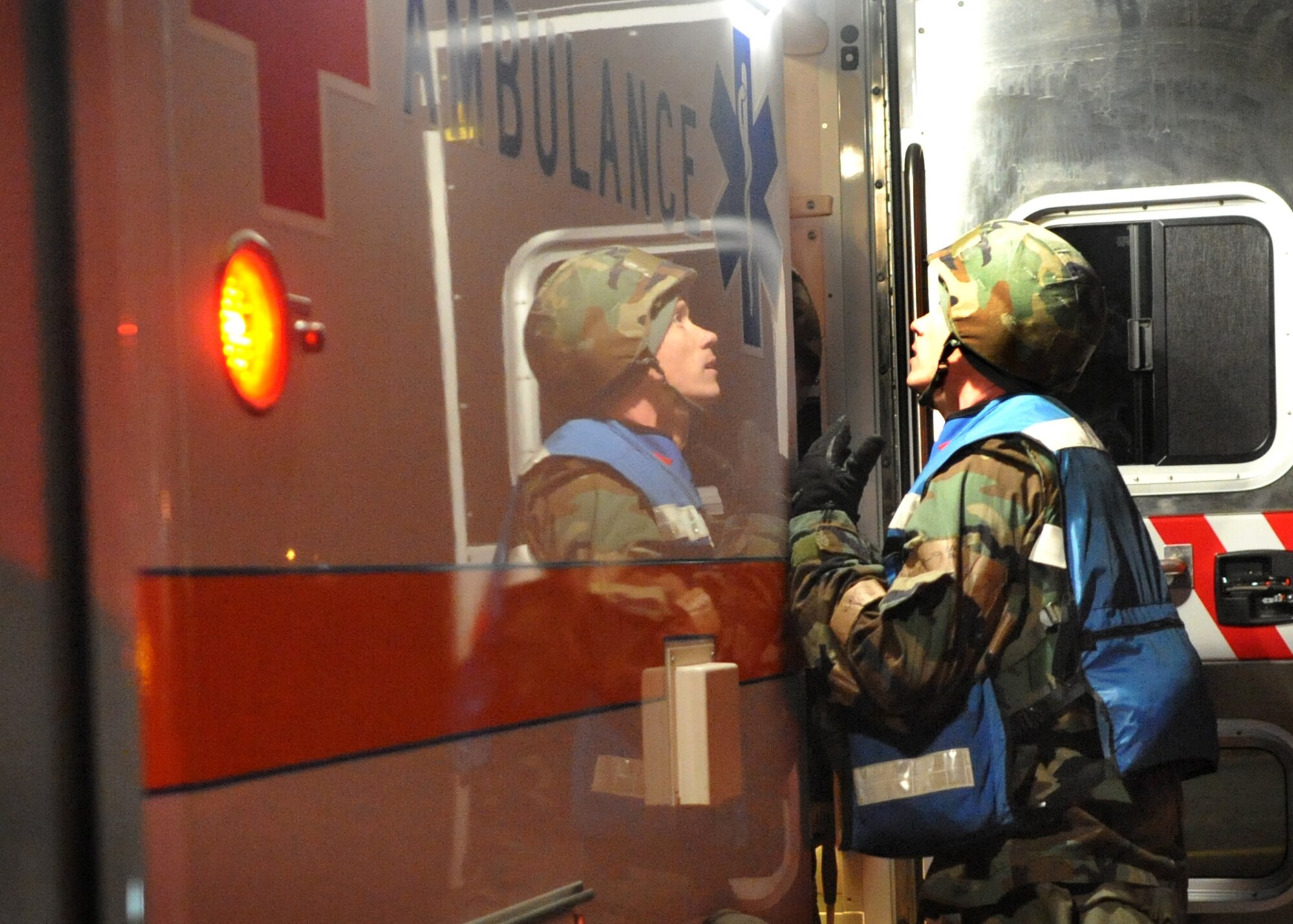 Staff Sergeant Jody Ohmer, 36th Fighter Squadron, responds to a simulated aircraft crash during Operational Readiness Exercise Beverly Midnight 11-01 at Osan Air Base, Republic of Korea Feb. 14.  The exercise allows Airmen to demonstrate their ability to complete the mission in simulated chemical environments while executing their primary duties, practicing self aid and buddy care, conduction post-attack reconnaissance and unexploded ordnance sweeps. (U.S. Air Force Photo/Senior Airman Evelyn Chavez)